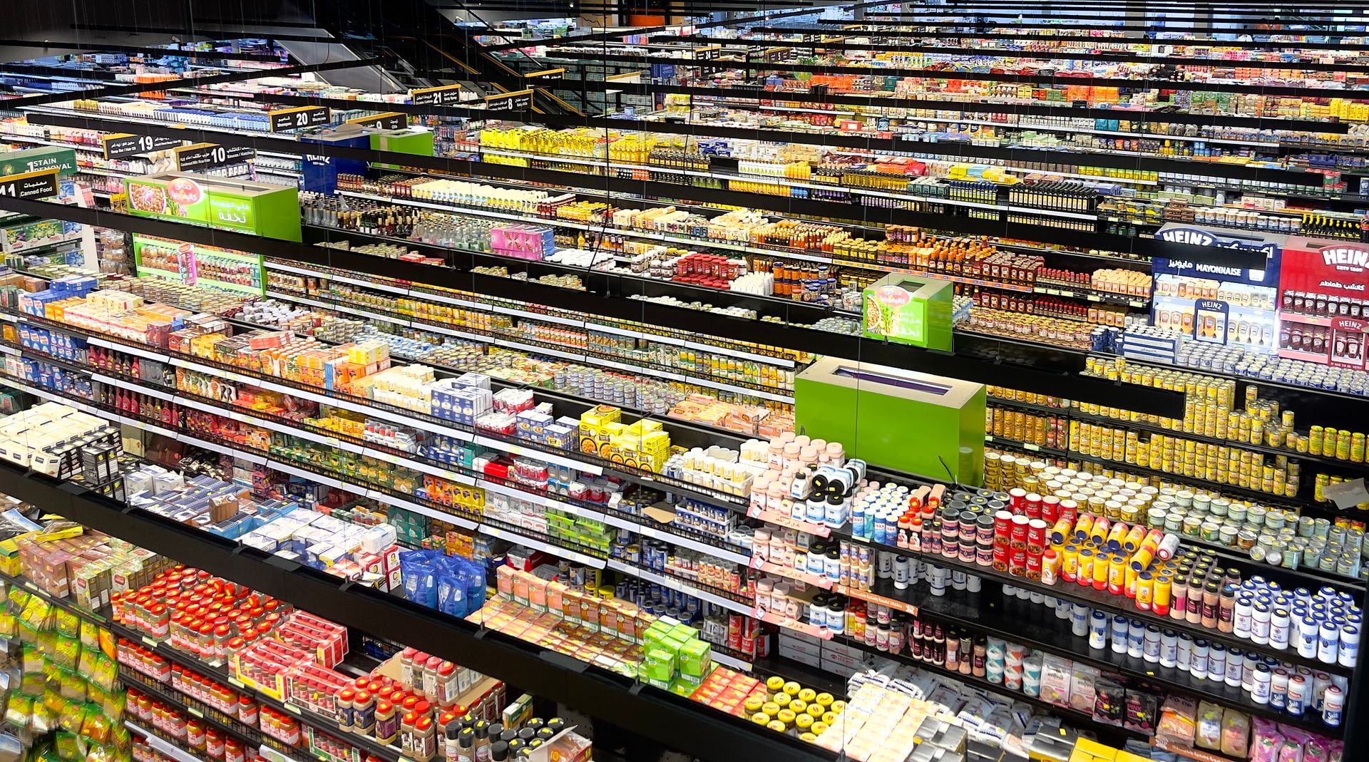 Supermarket aisle with refrigerated display cases