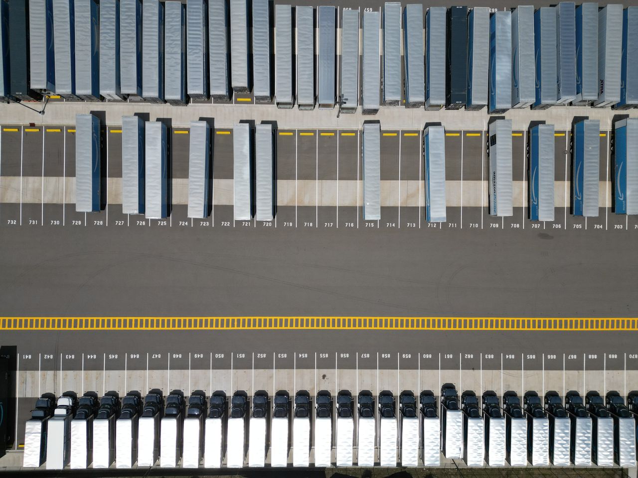 Refrigerated delivery truck at a loading dock